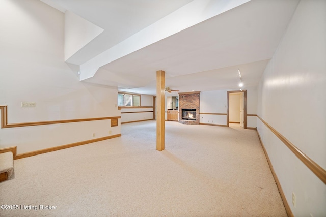 527 Woodlake Dr, Louisville, KY 40245 - basement featuring carpet floors and a fireplace