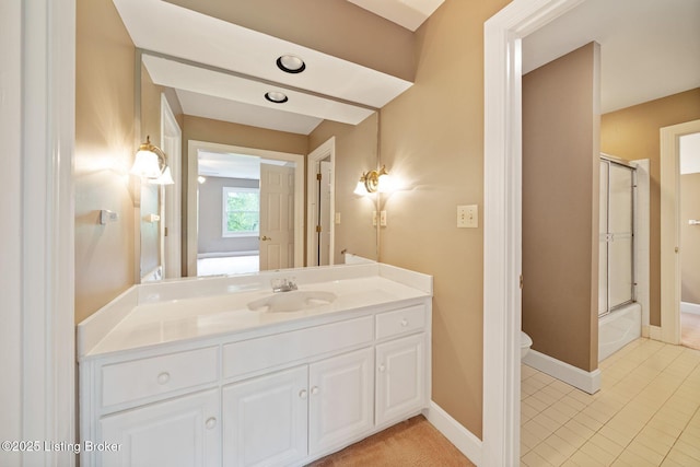 527 Woodlake Dr, Louisville, KY 40245 - full bath with vanity, bath / shower combo with glass door, and tile patterned flooring
