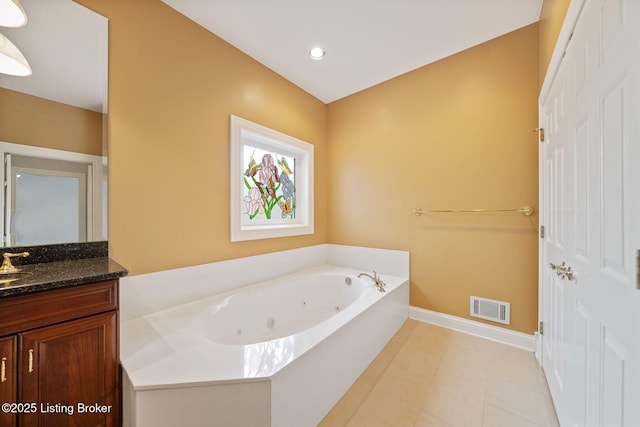 527 Woodlake Dr, Louisville, KY 40245 - bathroom featuring a jetted tub, vanity, and recessed lighting