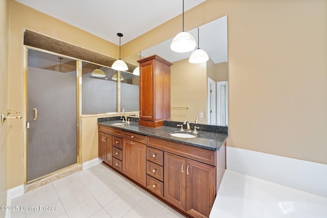527 Woodlake Dr, Louisville, KY 40245 - bathroom featuring a stall shower, double vanity, tile patterned flooring, and a bath