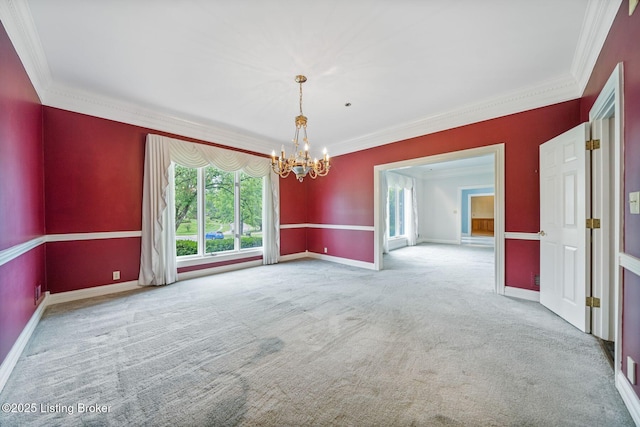 527 Woodlake Dr, Louisville, KY 40245 - carpeted spare room featuring ornamental molding and a chandelier