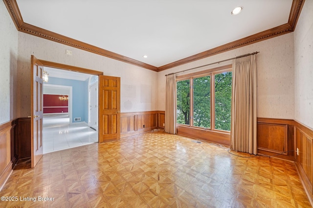 527 Woodlake Dr, Louisville, KY 40245 - empty room with wainscoting, ornamental molding, recessed lighting, and a decorative wall
