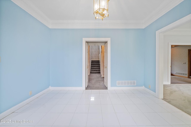 527 Woodlake Dr, Louisville, KY 40245 - carpeted empty room featuring crown molding, a chandelier, and tile patterned floors