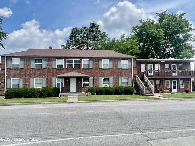 4143 Hillview Ave, Louisville, KY 40216 - townhome / multi-family property featuring brick siding and a front lawn