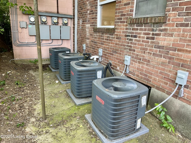 4143 Hillview Ave, Louisville, KY 40216 - exterior view of cooling unit, electric meter, and brick siding