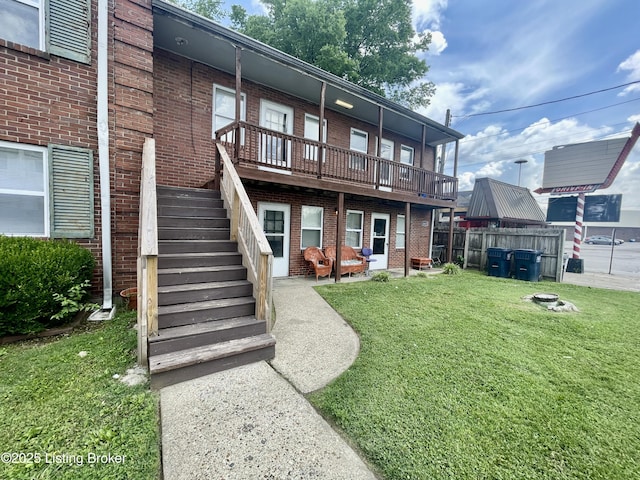 4143 Hillview Ave, Louisville, KY 40216 - rear view of property with brick siding and stairway