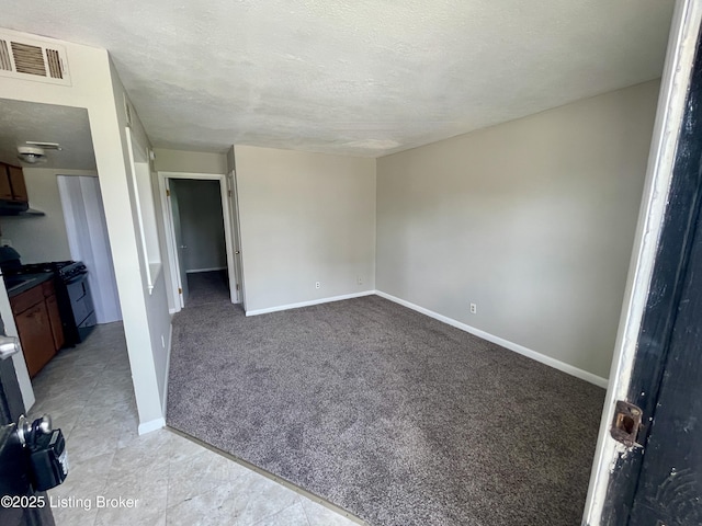 4143 Hillview Ave, Louisville, KY 40216 - unfurnished living room with baseboards, a textured ceiling, and light carpet