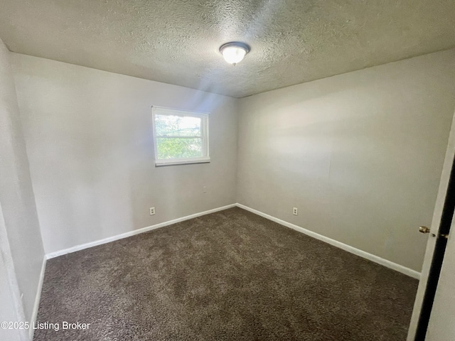 4143 Hillview Ave, Louisville, KY 40216 - unfurnished room featuring dark colored carpet, a textured ceiling, and baseboards