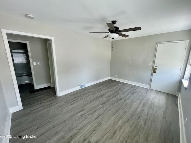 4143 Hillview Ave, Louisville, KY 40216 - spare room featuring ceiling fan, wood finished floors, baseboards, and a smoke detector