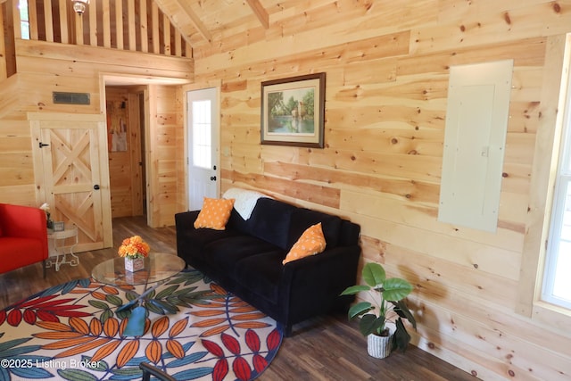 255 Little Cabin Ln, Falls Of Rough, KY 40119 - living room with vaulted ceiling, wood finished floors, wood walls, wooden ceiling, and healthy amount of natural light