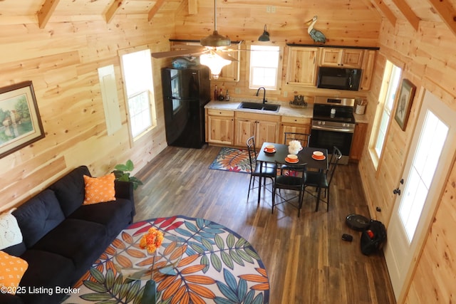 255 Little Cabin Ln, Falls Of Rough, KY 40119 - living room featuring wooden walls, dark wood-type flooring, and ceiling fan