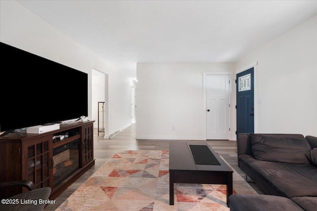 812 Castlewood Dr, New Albany, IN 47150 - living room featuring wood finished floors and baseboards
