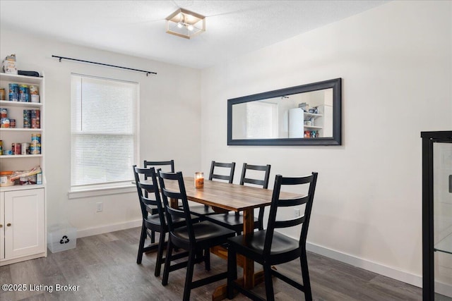 812 Castlewood Dr, New Albany, IN 47150 - dining area with wood finished floors and baseboards