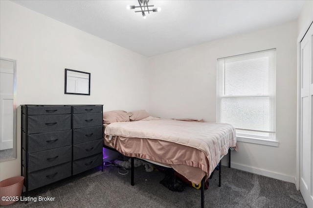 812 Castlewood Dr, New Albany, IN 47150 - carpeted bedroom featuring baseboards