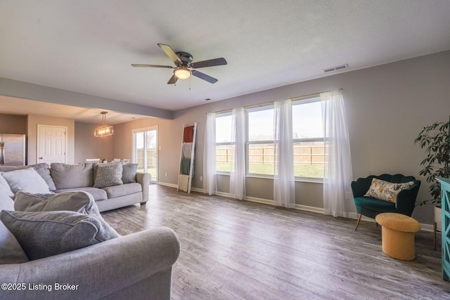 108 Ruby Farm Dr, Mt Washington, KY 40047 - living area with baseboards, wood finished floors, and ceiling fan
