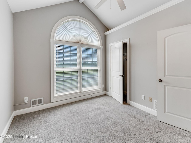 14409 Estate Ridge Blvd, Louisville, KY 40291 - unfurnished bedroom featuring baseboards, vaulted ceiling, carpet floors, ceiling fan, and crown molding