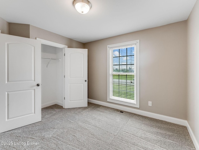 14409 Estate Ridge Blvd, Louisville, KY 40291 - unfurnished bedroom with carpet, baseboards, and a closet