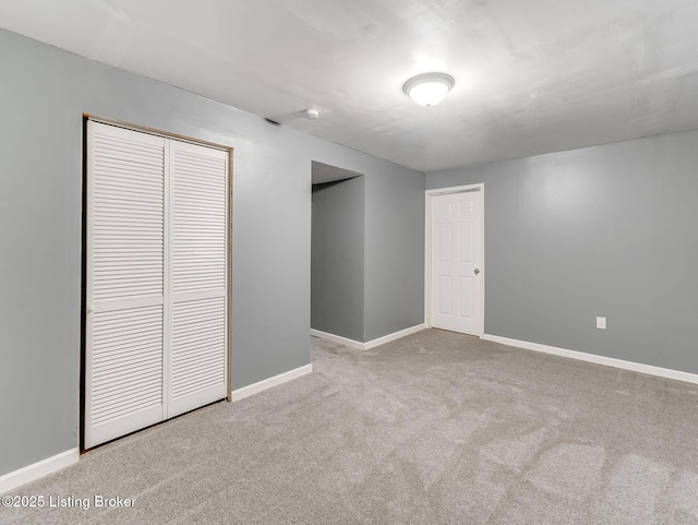 14409 Estate Ridge Blvd, Louisville, KY 40291 - unfurnished bedroom with carpet, baseboards, and a closet
