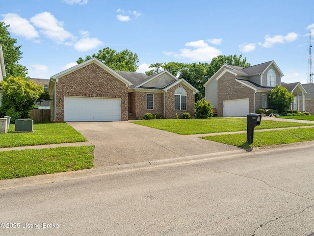 14409 Estate Ridge Blvd, Louisville, KY 40291 - view of front of home with brick siding, an attached garage, and concrete driveway