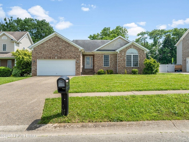14409 Estate Ridge Blvd, Louisville, KY 40291 - ranch-style house with concrete driveway, an attached garage, and brick siding