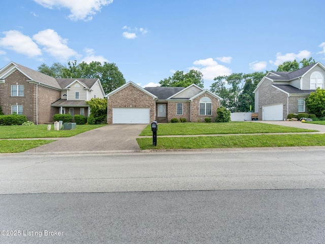 14409 Estate Ridge Blvd, Louisville, KY 40291 - view of front of house with asphalt driveway, brick siding, a front yard, and a garage