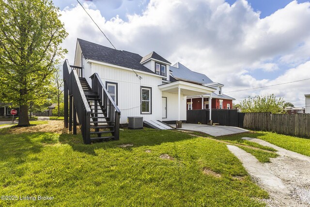 125 N Walnut St, Cynthiana, KY 41031 - rear view of house featuring central AC unit, stairs, and a patio area