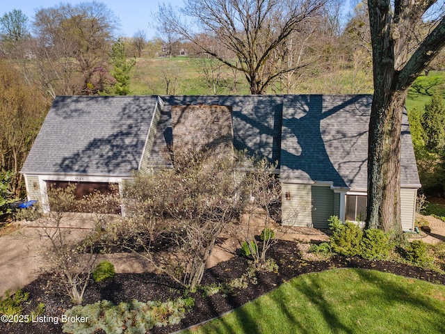 1140 Rostrevor Cir, Louisville, KY 40205 - view of property exterior featuring roof with shingles