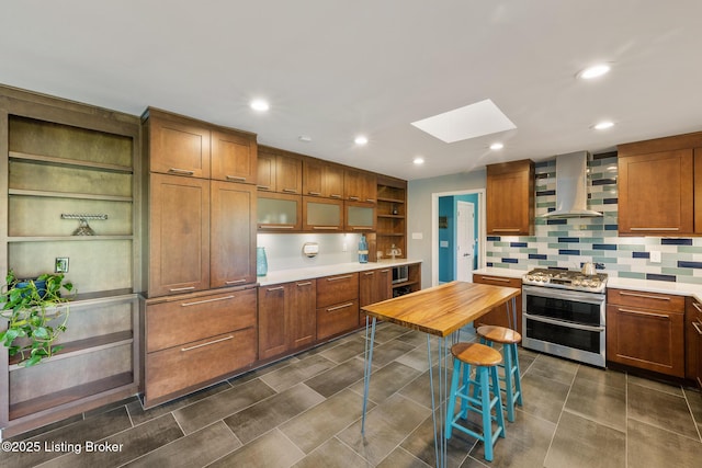 1140 Rostrevor Cir, Louisville, KY 40205 - kitchen with extractor fan, double oven range, open shelves, a skylight, and light countertops