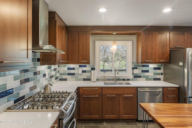 1140 Rostrevor Cir, Louisville, KY 40205 - kitchen featuring stainless steel appliances, a sink, wall chimney range hood, backsplash, and wood counters