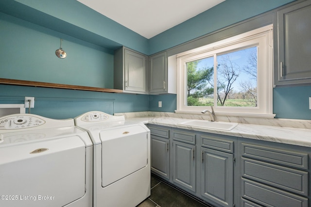 1140 Rostrevor Cir, Louisville, KY 40205 - laundry area featuring cabinet space, separate washer and dryer, and dark tile patterned floors