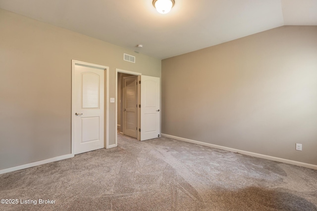6803 Park Vista Way, Louisville, KY 40229 - unfurnished bedroom with carpet, baseboards, and lofted ceiling