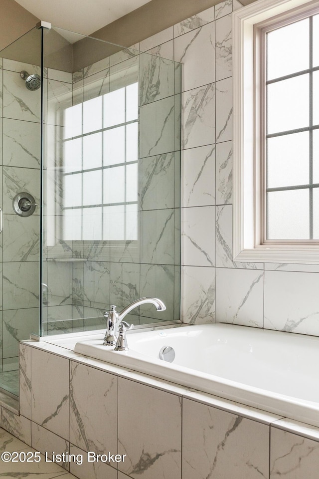 6803 Park Vista Way, Louisville, KY 40229 - bathroom with a marble finish shower, a bath, and tile walls
