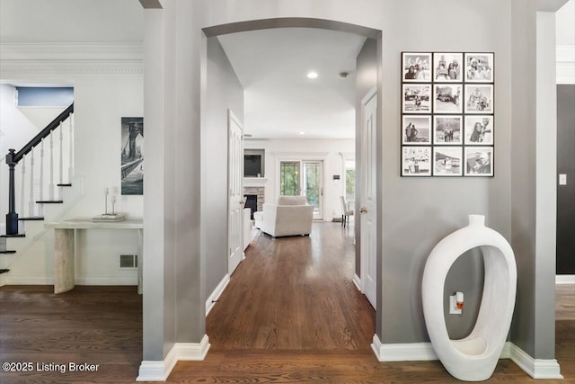 4705 Holly Forest Ct, Louisville, KY 40245 - hallway featuring arched walkways, wood finished floors, stairway, recessed lighting, and baseboards