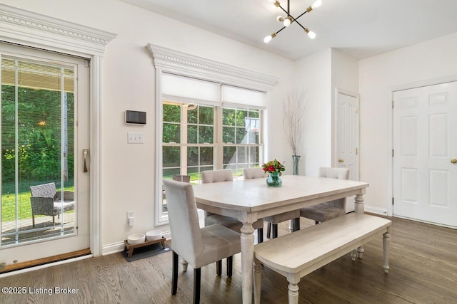 4705 Holly Forest Ct, Louisville, KY 40245 - dining area with a chandelier, wood finished floors, and baseboards
