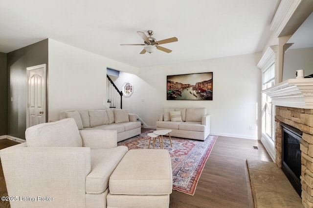 4705 Holly Forest Ct, Louisville, KY 40245 - living room featuring a fireplace, a ceiling fan, wood finished floors, and baseboards