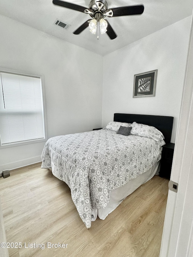 445 Marret Ave, Louisville, KY 40208 - bedroom featuring light wood finished floors, a ceiling fan, and baseboards