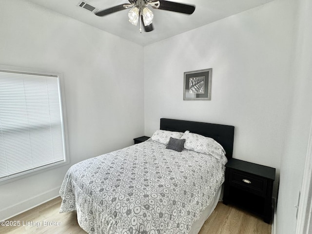 445 Marret Ave, Louisville, KY 40208 - bedroom with light wood finished floors, baseboards, and ceiling fan