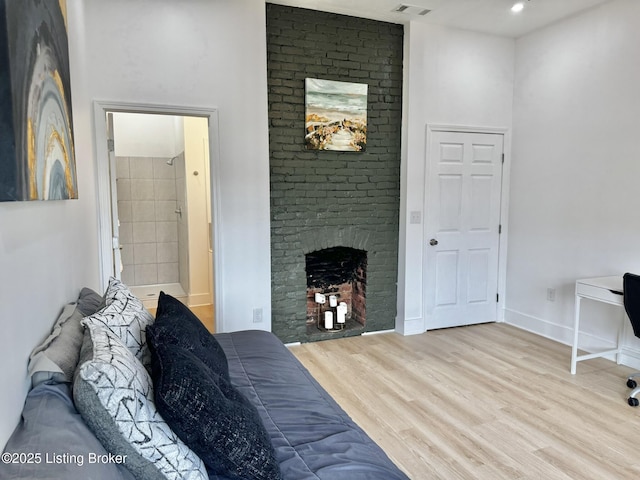 445 Marret Ave, Louisville, KY 40208 - living area featuring light wood-style flooring, a fireplace, baseboards, and recessed lighting