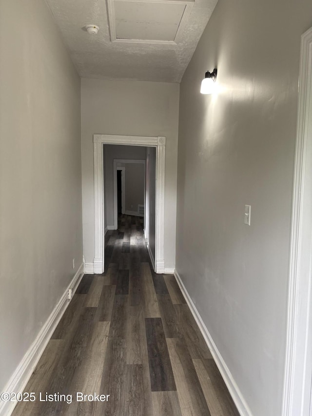 1724 Garland Ave, Louisville, KY 40210 - corridor featuring attic access, dark wood finished floors, and baseboards