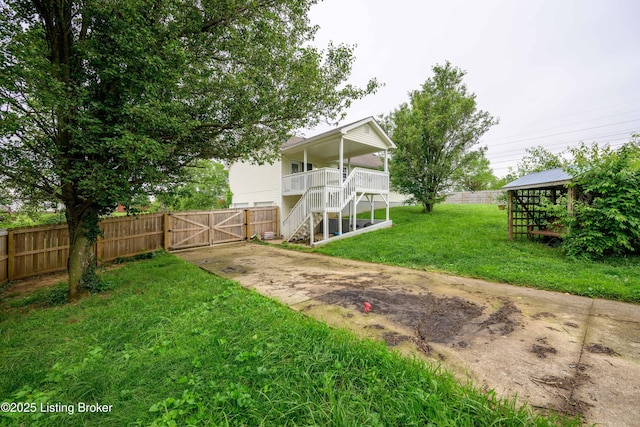 198 Cecilia Smiths Mill Rd, Cecilia, KY 42724 - view of yard with stairs, a gate, driveway, and a porch