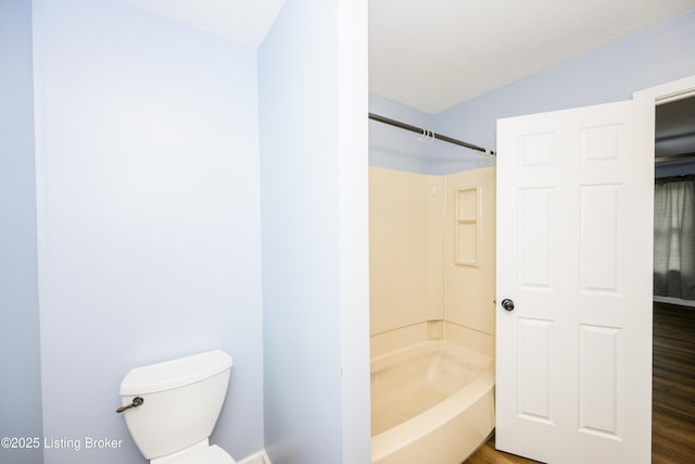 198 Cecilia Smiths Mill Rd, Cecilia, KY 42724 - full bath featuring toilet, wood finished floors, and shower / washtub combination