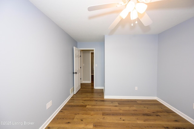 198 Cecilia Smiths Mill Rd, Cecilia, KY 42724 - unfurnished room with ceiling fan, wood finished floors, and baseboards