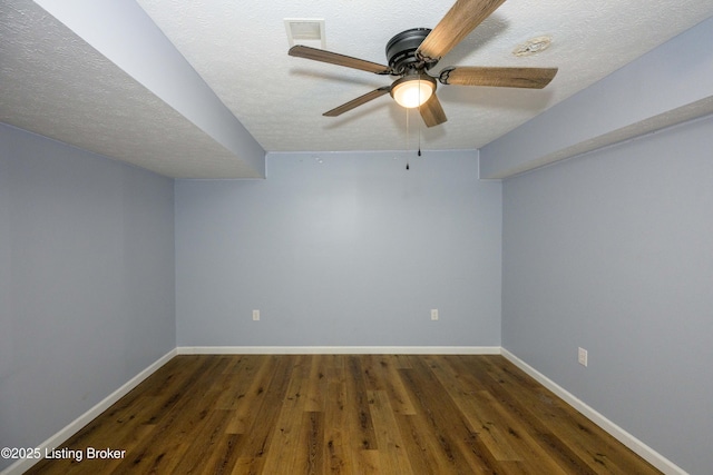 198 Cecilia Smiths Mill Rd, Cecilia, KY 42724 - unfurnished room with ceiling fan, a textured ceiling, wood finished floors, and baseboards