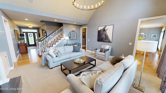 103 Morgan Ct, Bardstown, KY 40004 - living room with stairs, a chandelier, light colored carpet, recessed lighting, and baseboards