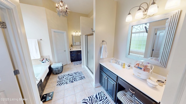103 Morgan Ct, Bardstown, KY 40004 - full bathroom with a chandelier, a garden tub, vanity, a stall shower, and tile patterned flooring