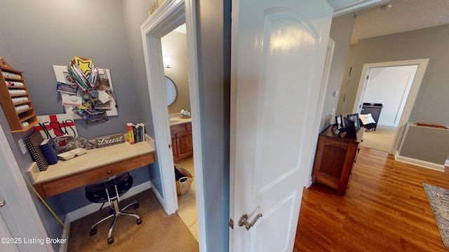 103 Morgan Ct, Bardstown, KY 40004 - corridor featuring wood finished floors, a desk, and baseboards