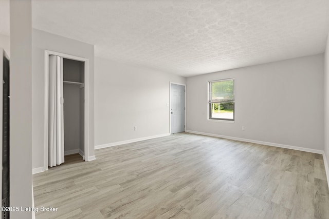 623 Westport Rd, Elizabethtown, KY 42701 - unfurnished bedroom featuring light wood-type flooring and baseboards