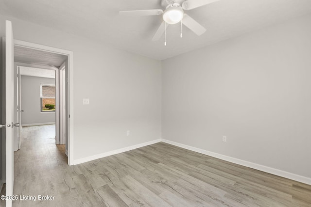 623 Westport Rd, Elizabethtown, KY 42701 - spare room with wood finished floors, baseboards, and ceiling fan