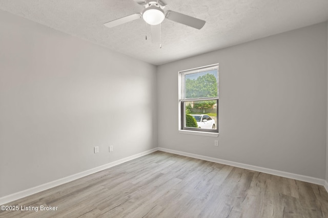 623 Westport Rd, Elizabethtown, KY 42701 - empty room featuring wood finished floors, a textured ceiling, baseboards, and a ceiling fan
