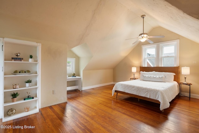 857 Melford Ave, Louisville, KY 40217 - bedroom with hardwood / wood-style floors, vaulted ceiling, baseboards, and ceiling fan
